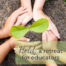 Hands around a sapling with the text, "Held: a retreat for educators"